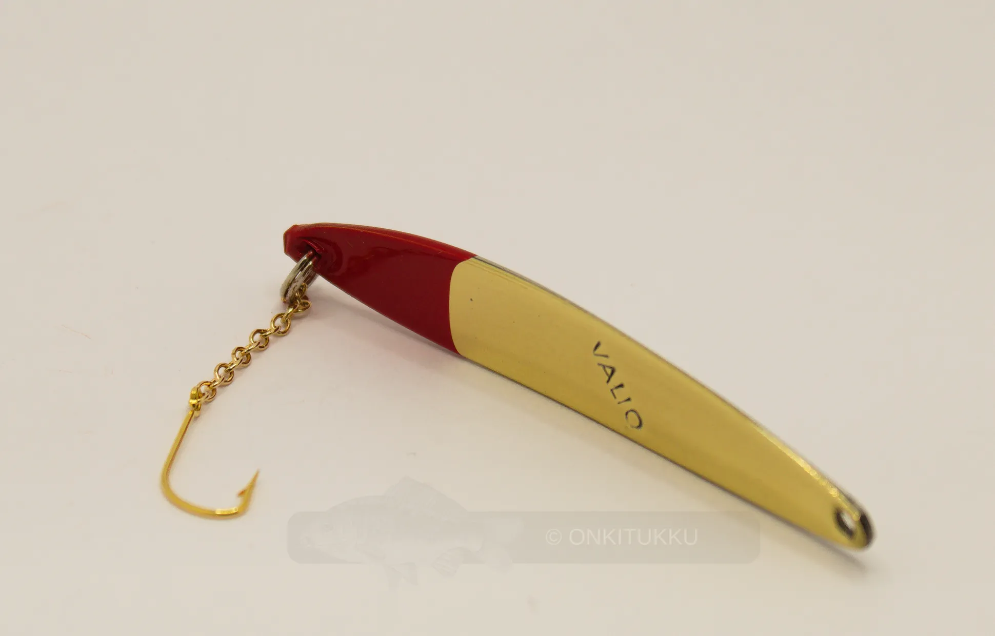 Valio pilkki 6,5cm messinki-hopea